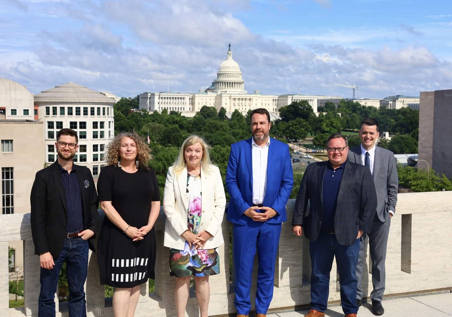 Joelle Foster, MP Valerie Bradford, Carlos Vanderloo, MP Bryan May, Matthew Klassen. Photo of candanian delegation wtih Canadian Embassy offici